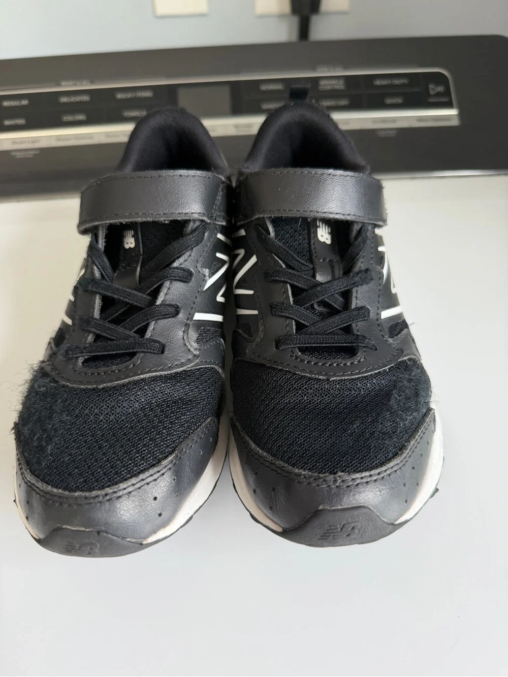 New Balance Kids Black and White Sneakers